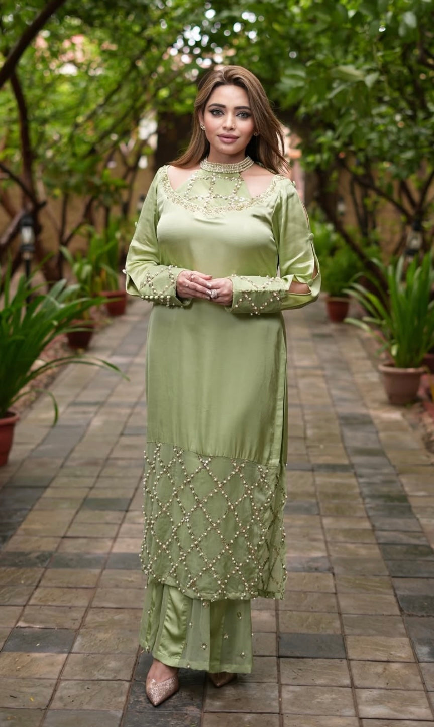 Green Dress features a stylish shoulder cut design