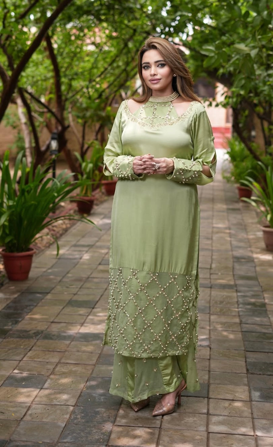 Green Dress features a stylish shoulder cut design