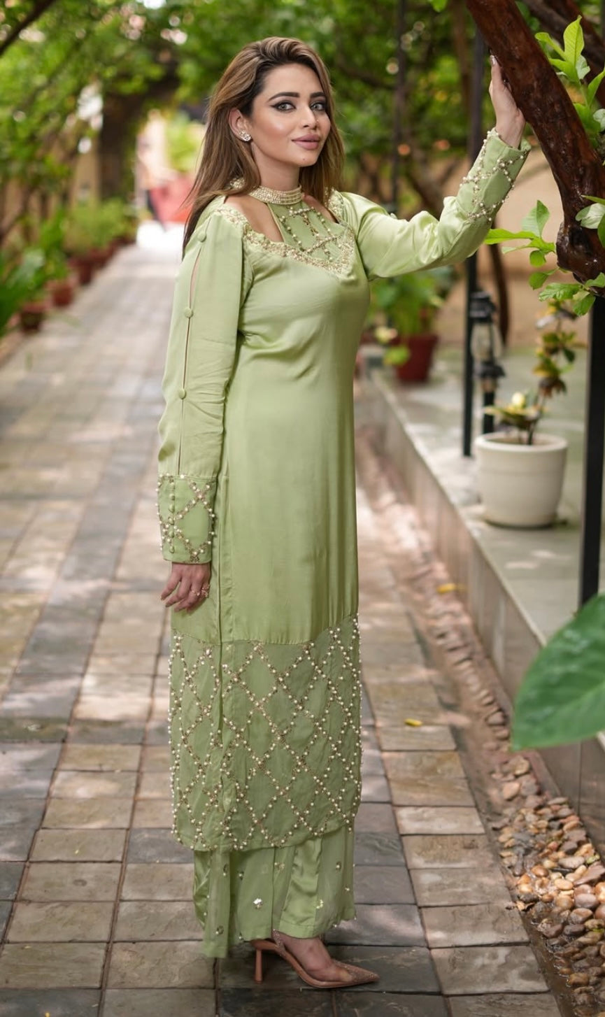 Green Dress features a stylish shoulder cut design