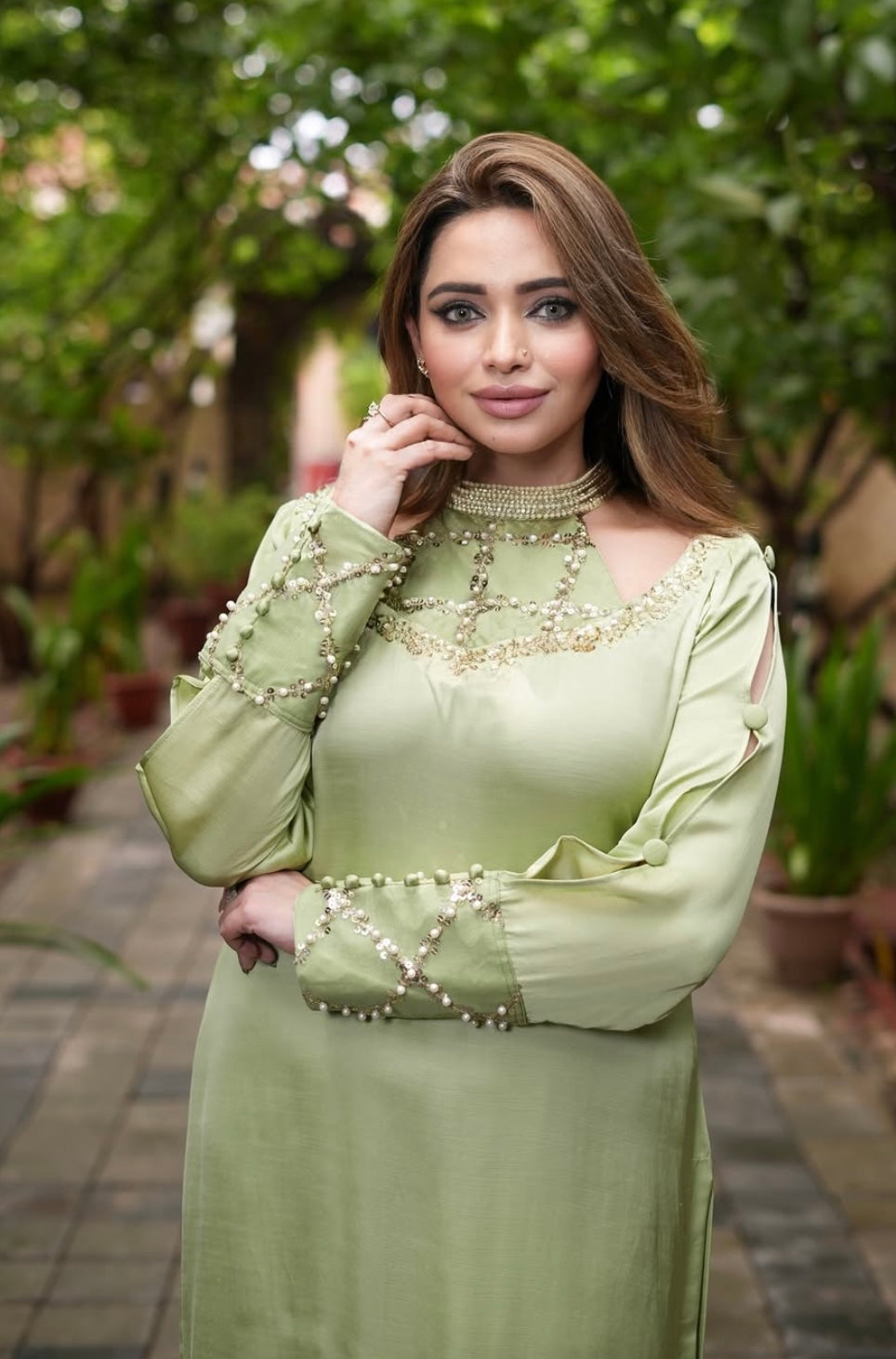 Green Dress features a stylish shoulder cut design