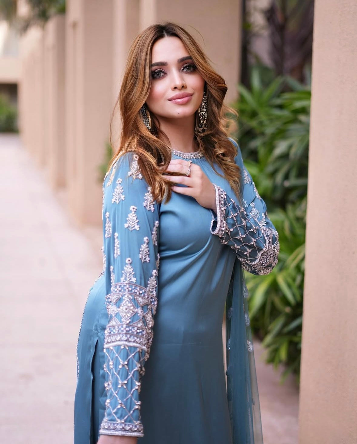 Long kamiz paired with a richly textured heavy dupatta