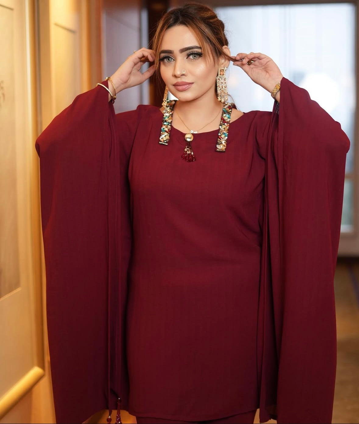 Elegant kaftan top paired seamlessly with matching pants