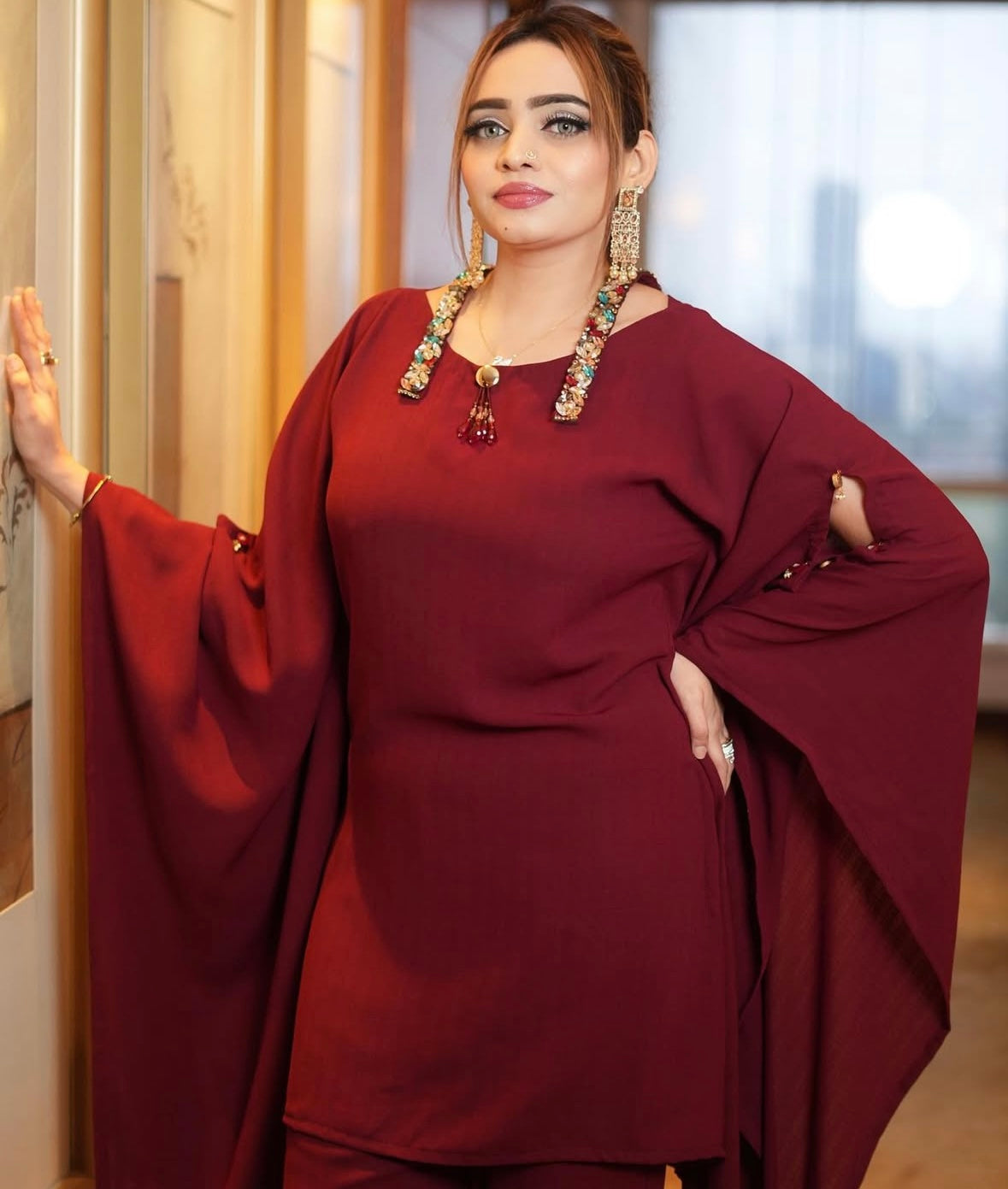 Elegant kaftan top paired seamlessly with matching pants