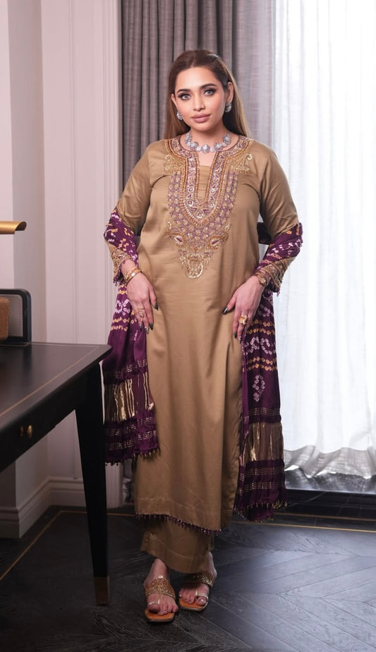 Elegant dress features a traditional Badhani dupatta