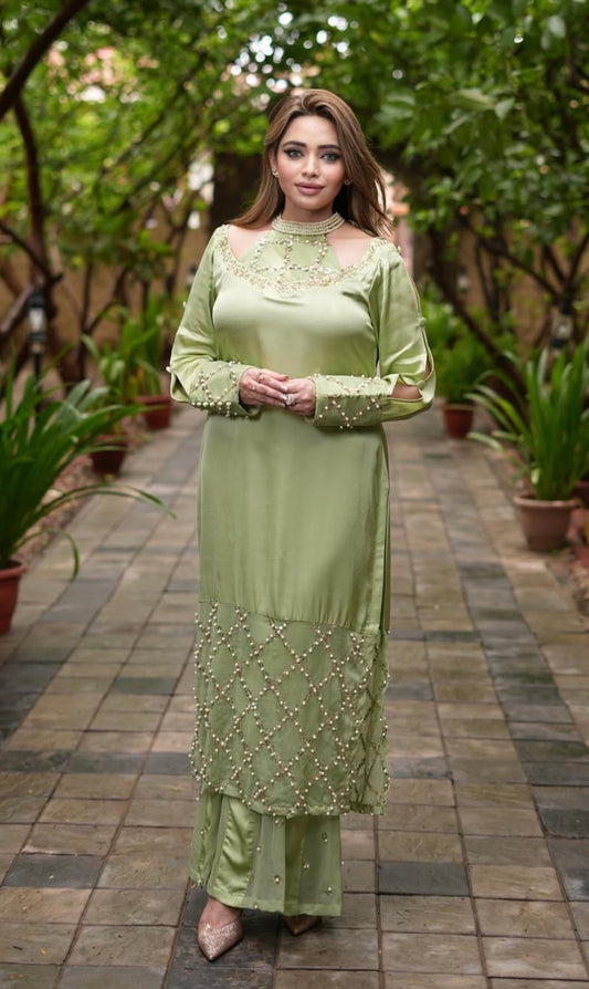 Green Dress features a stylish shoulder cut design