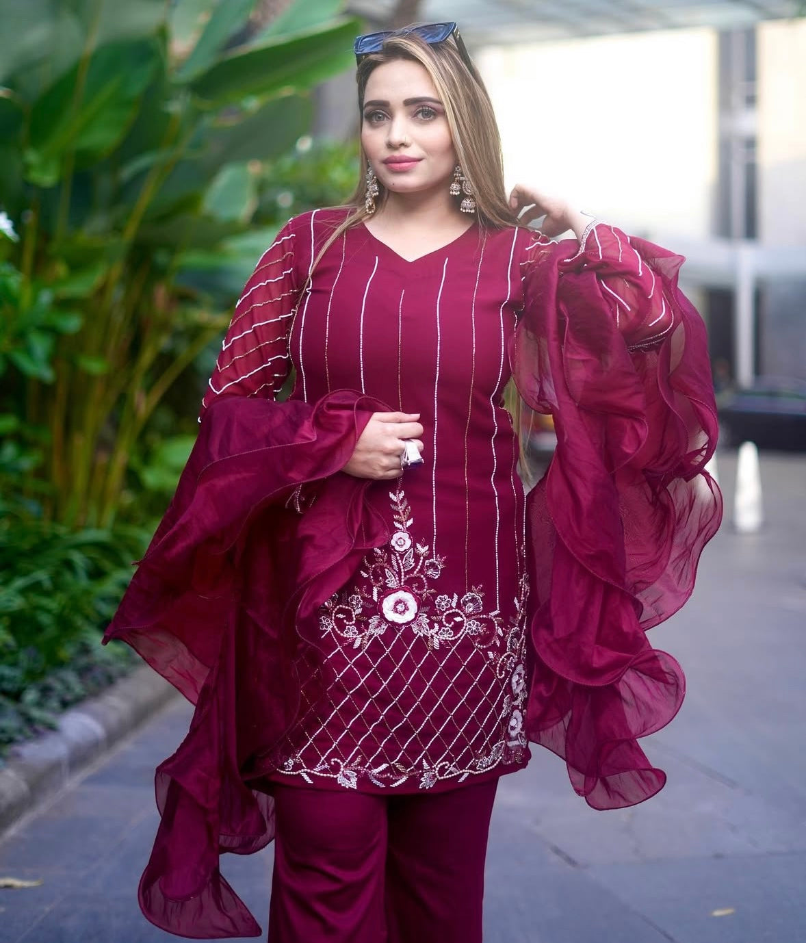 Rani red dress featuring graceful bell bottoms