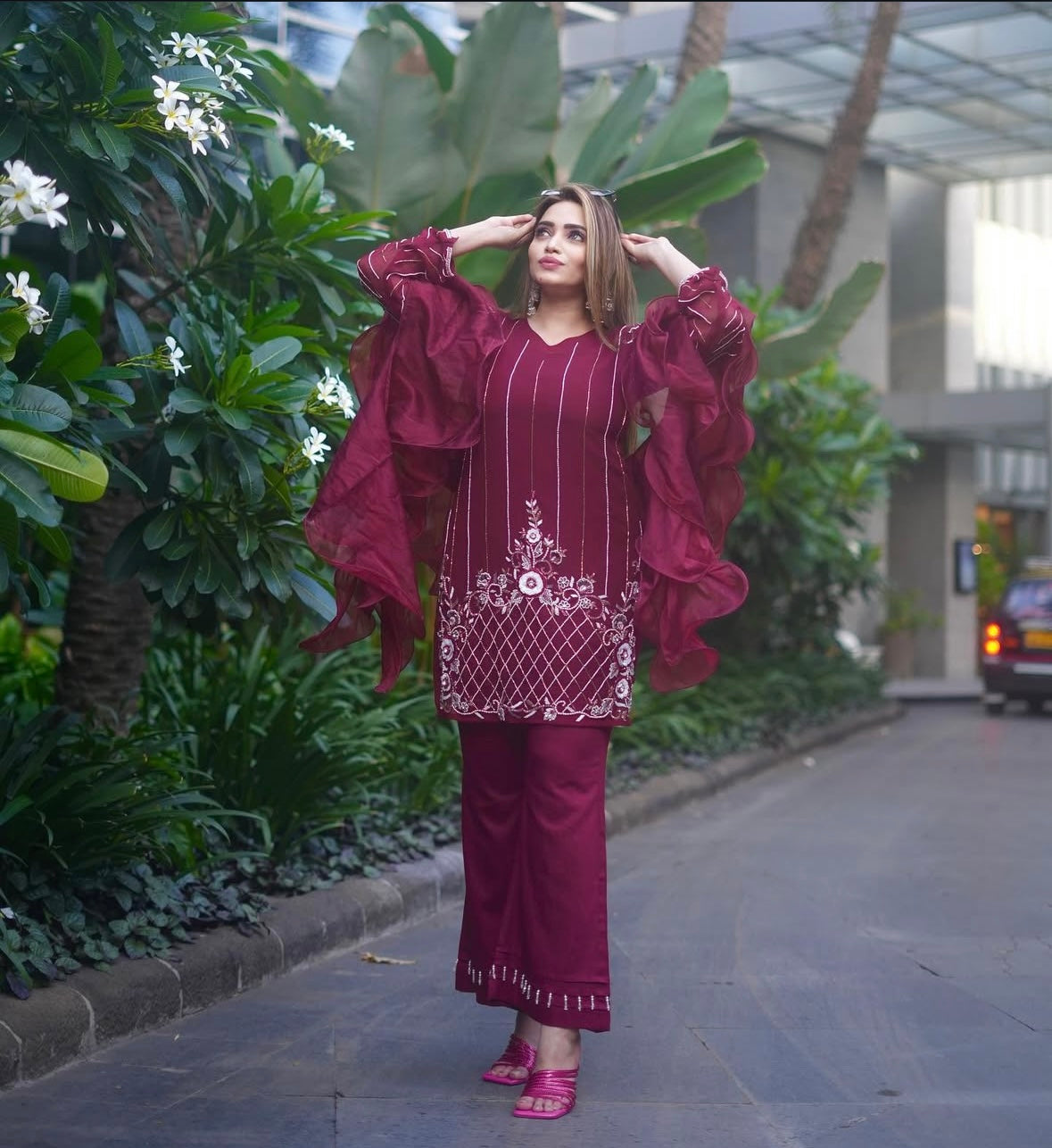 Rani red dress featuring graceful bell bottoms
