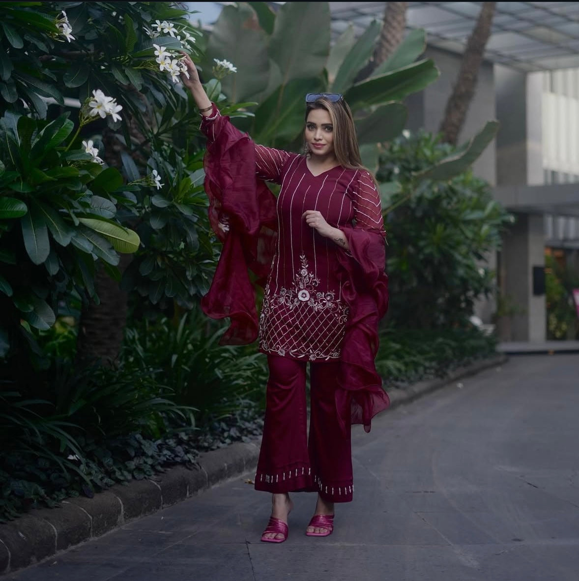 Rani red dress featuring graceful bell bottoms